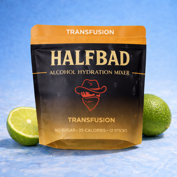 HALFBAD alcohol hydration mixer package with limes on a blue background